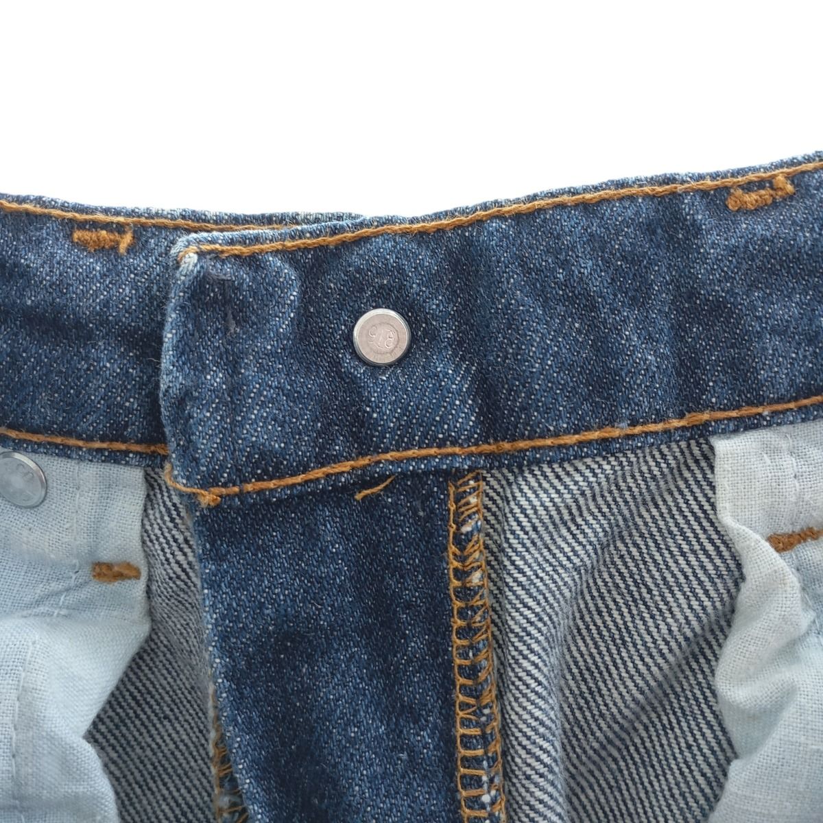テーパードデニムパンツ