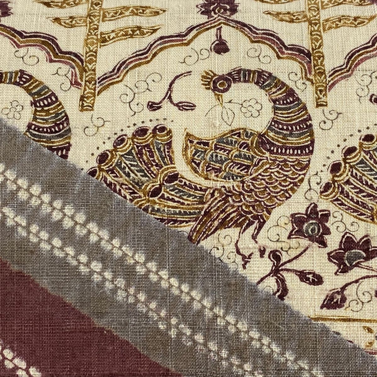 名古屋帯 秀品 紬地 孔雀 草花 絞り 小豆色 正絹