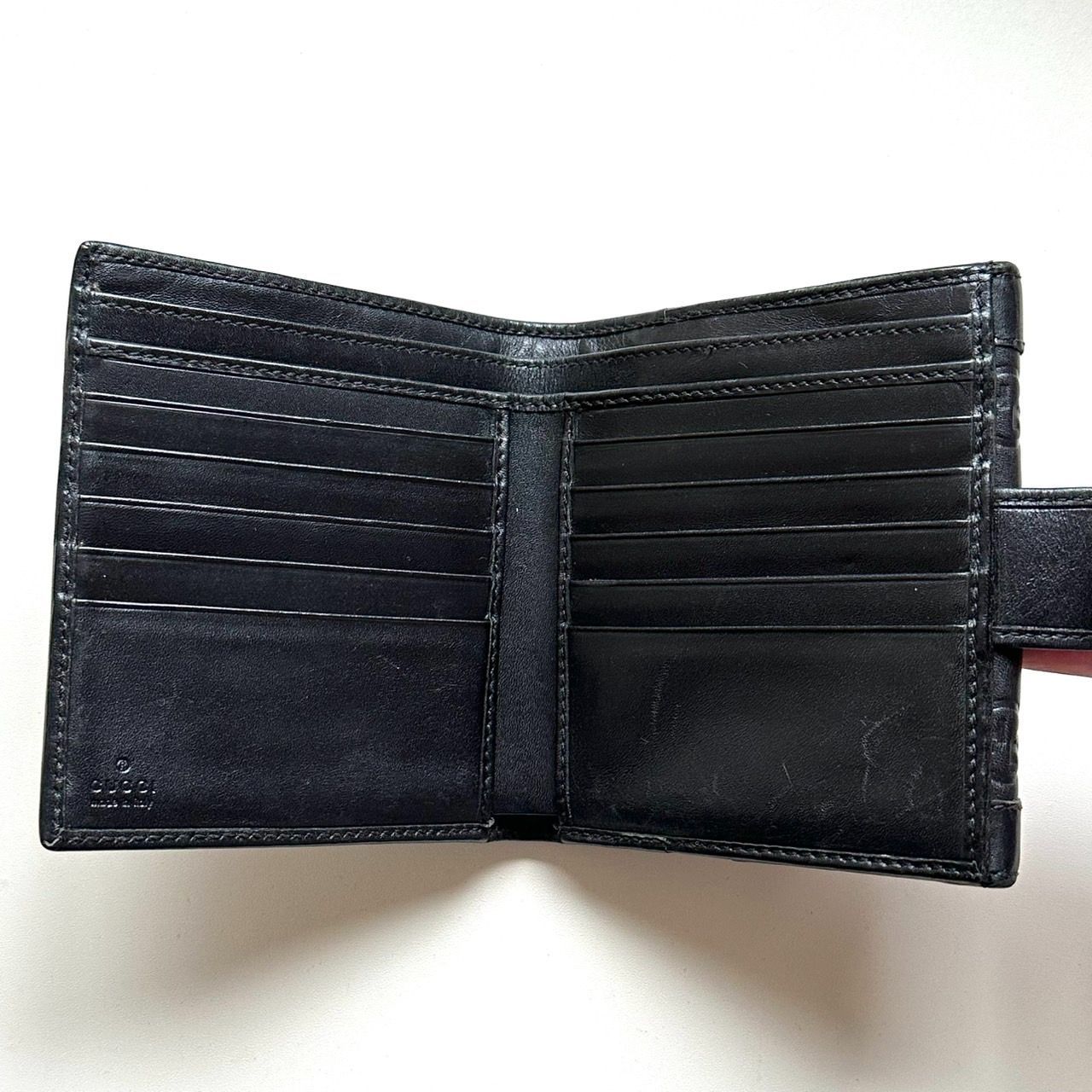 グッチ GUCCI 二つ折り財布 グッチシマ ゴールドロゴプレート ブラック