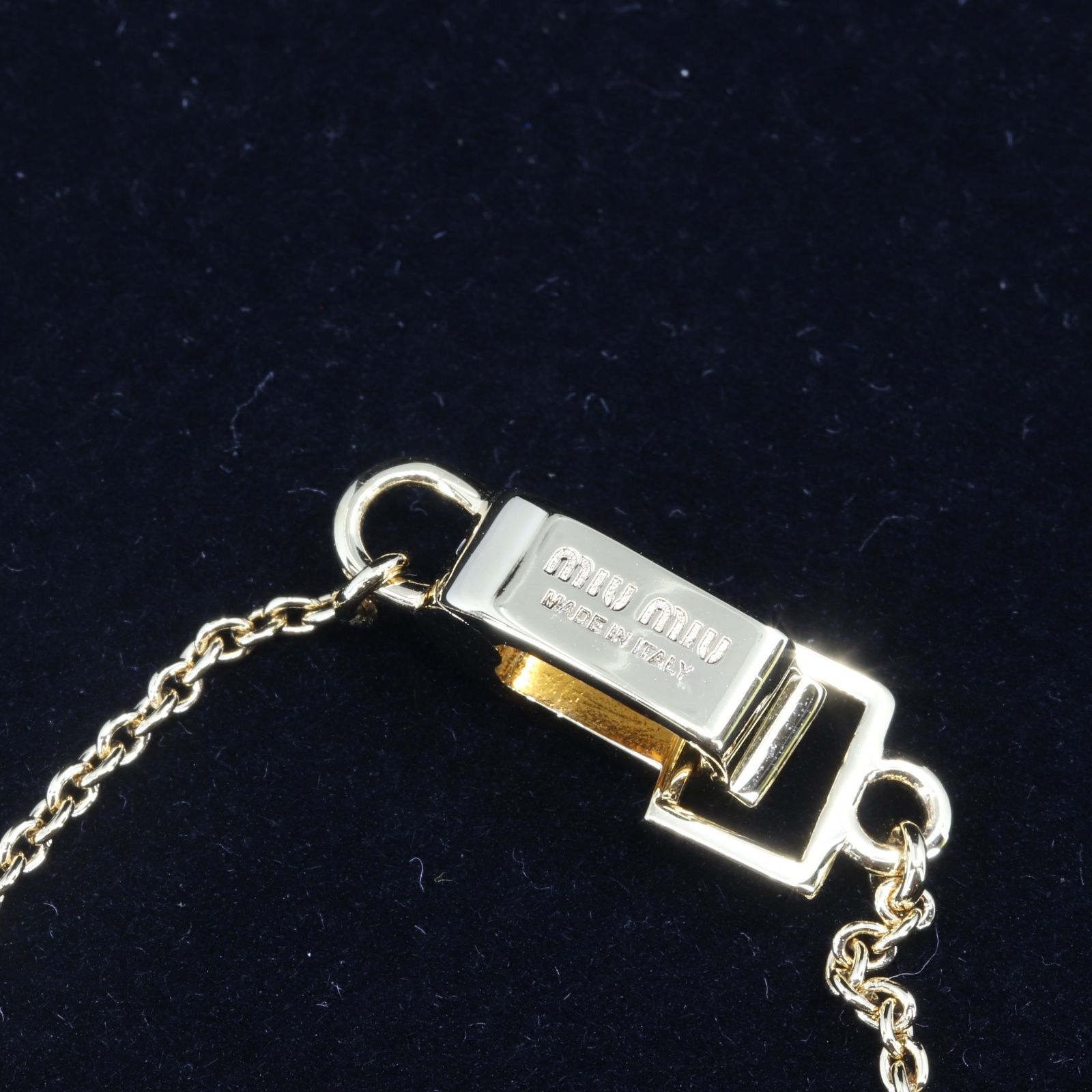 ITEH45KF4NZA 美品 MIU MIU ミュウミュウ ロゴモチーフ ラインストーン 