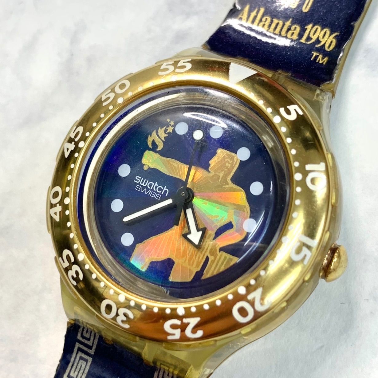 超希少品⭐️SWATCH スウォッチ】 1996年アトランタオリンピック記念時計 スウォッチ ヴィンテージ ネイビー×ゴールドカラー 電池交換済 稼動品  （SNA） - メルカリ