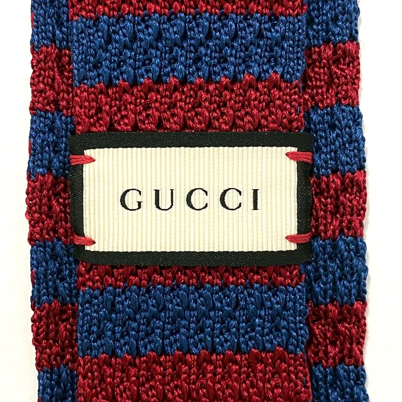 GUCCI ネイビーと赤のストライプ ニットマフラー キッズ服(100cm~) GUCCI ネイビー赤ストライプセーター