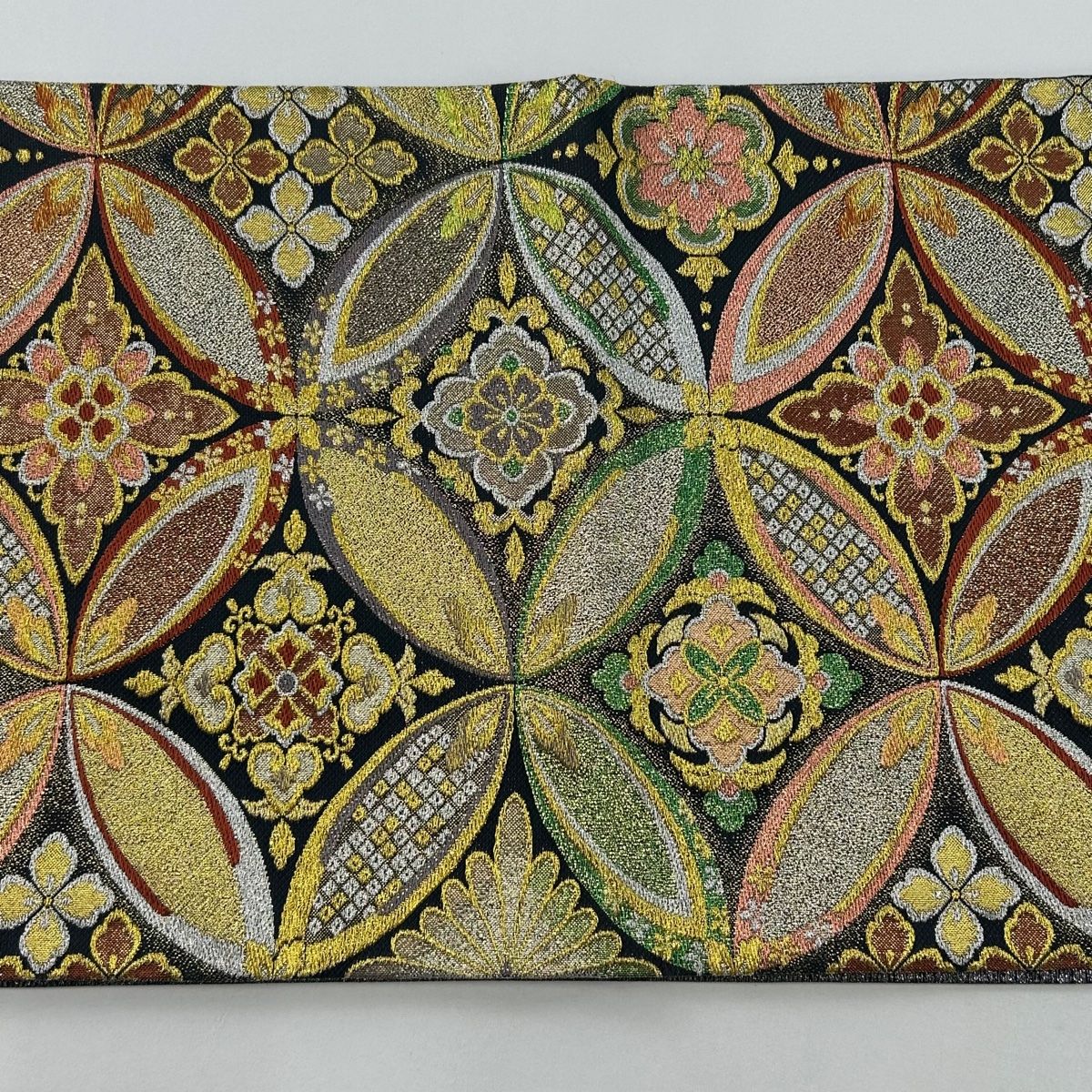 袋帯 美品 秀品 振袖向き 七宝文 花菱 金銀糸 ラメ糸 黒 六通