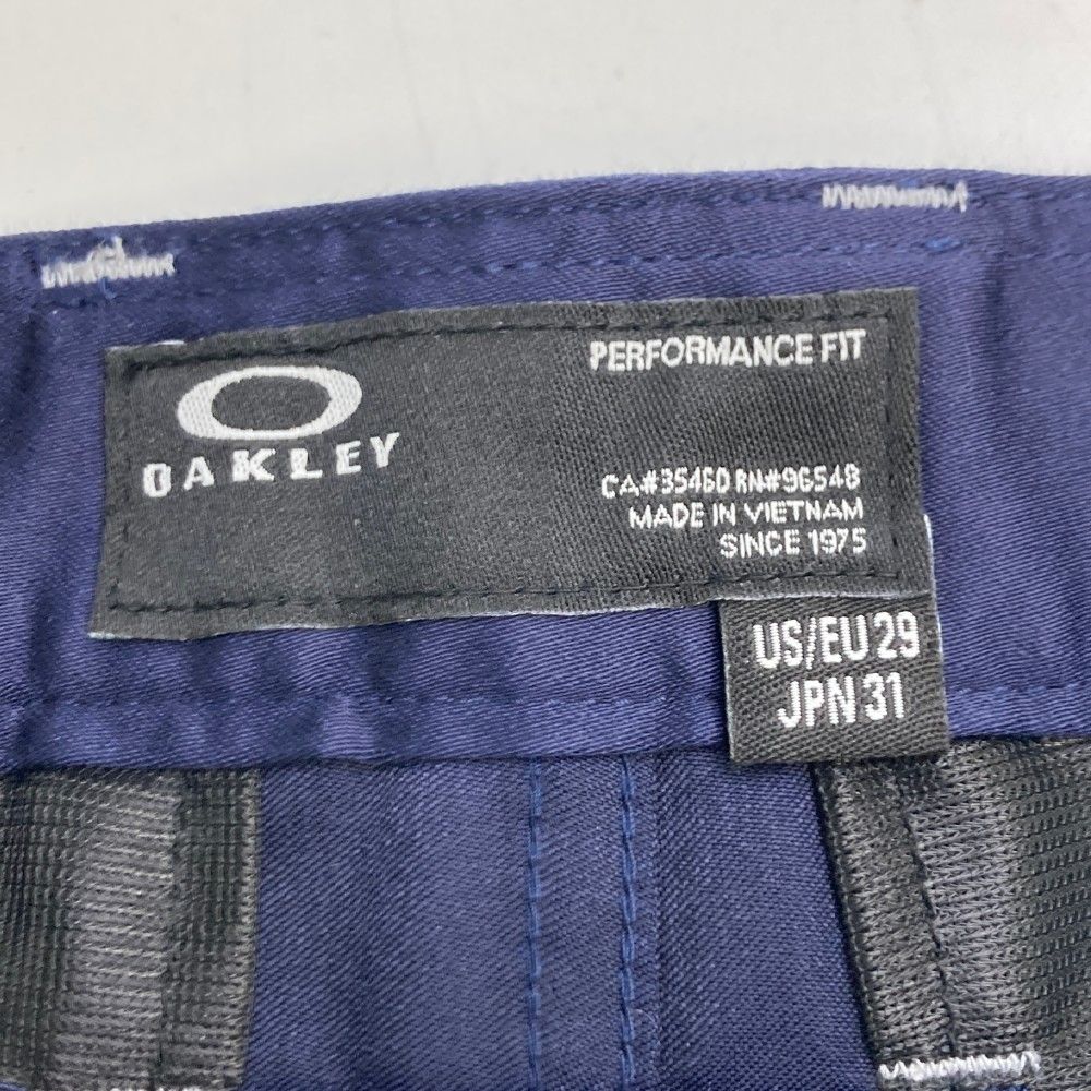 サイズ：29 OAKLEY オークリー  パンツ  ネイビー系 [240101432379] ゴルフウェア メンズ ストスト サイズ：29 OAKLEY オークリー パンツ ネイビー系 [240101432379