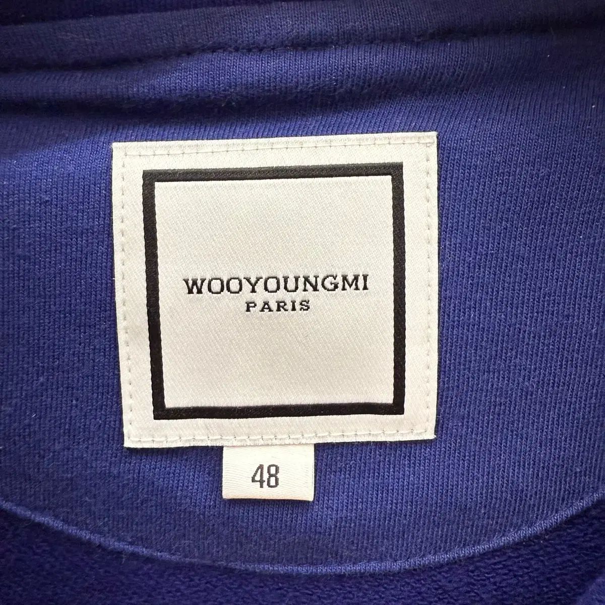 48 サイズ WOOYOUNGMI(ウーヨンミ) ロゴ バックロゴ フード付きTシャツ 