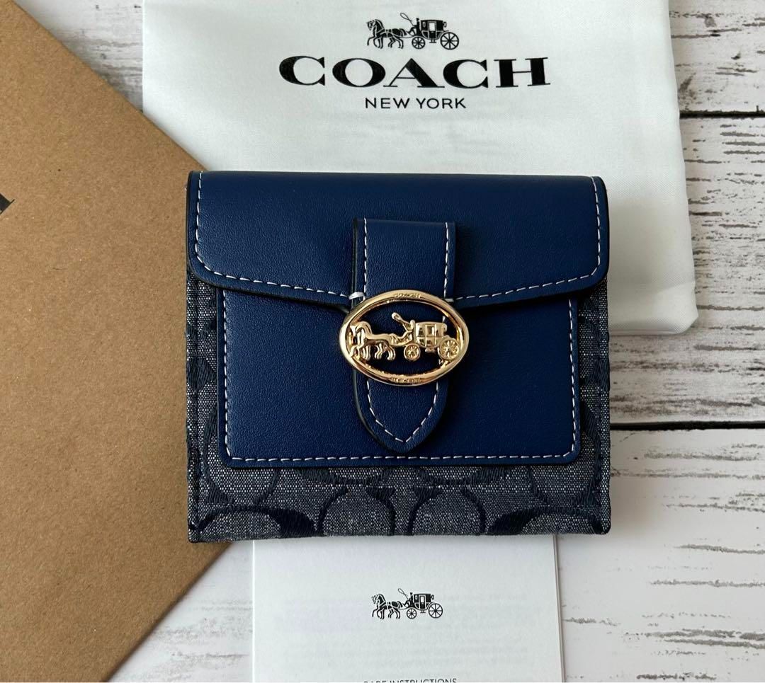 新品未使用】COACH コーチ二つ折り財布 馬モチーフブルーシグネチャー - メルカリ