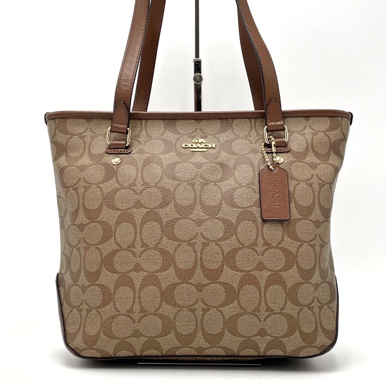 レディース 美品 COACH ハンドバッグ シグネチャー ロゴ金具 PVC ベージュ