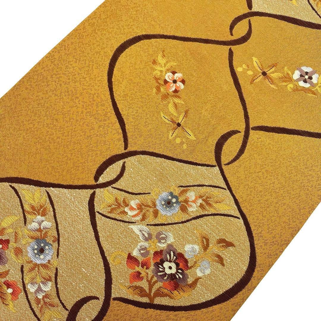 袋帯 まわた紬 夢 花模様 木蘭色 O-4157 - メルカリ 