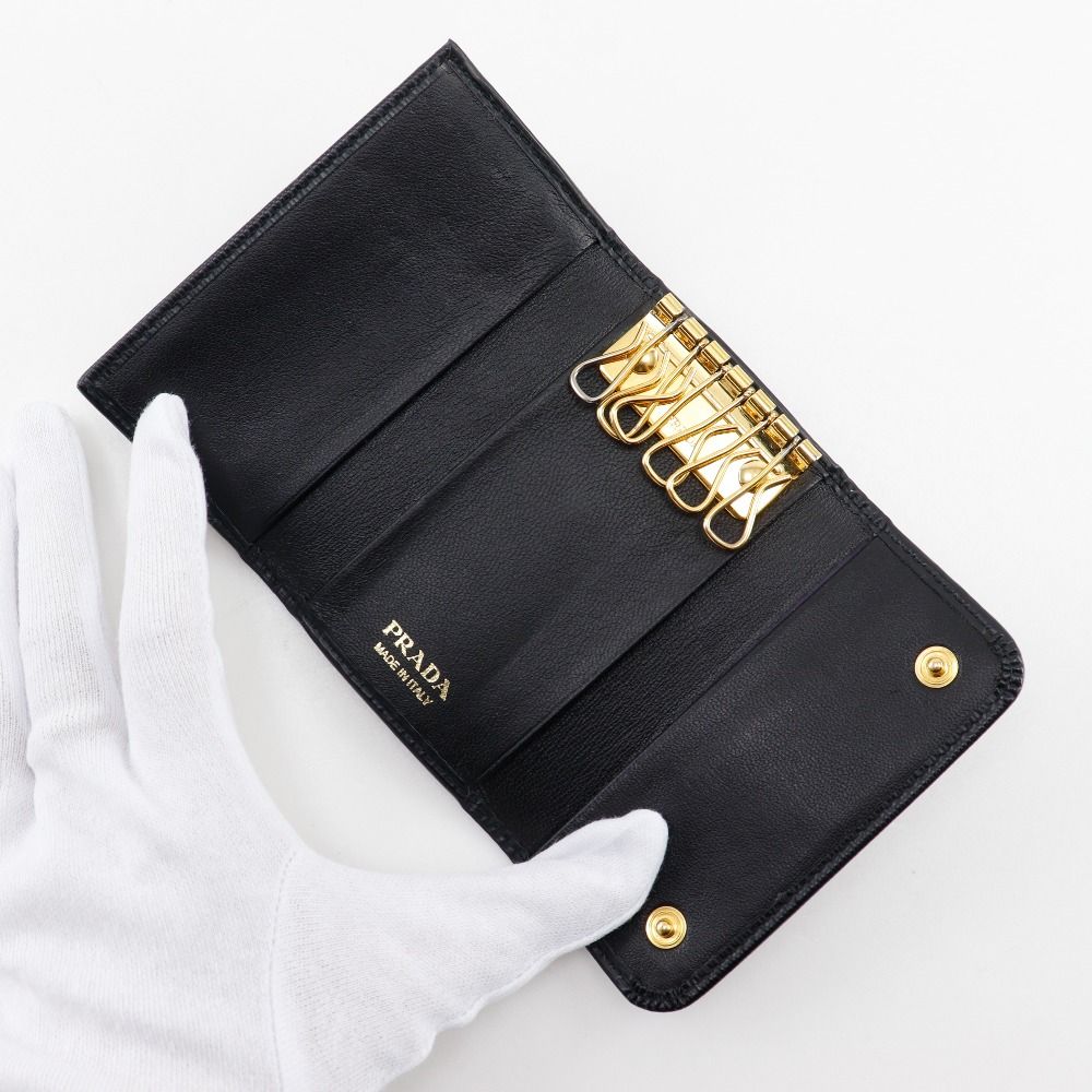 PRADA】プラダ ロゴ金具 6連 レザー _ キーケース - メルカリ