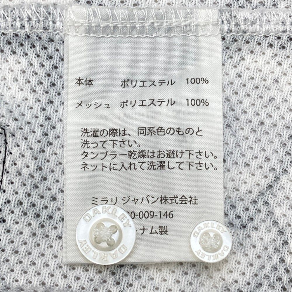 サイズ：M OAKLEY オークリー  半袖ポロシャツ ボタンダウン 総柄 ホワイト系 [240101437448] ゴルフウェア メンズ ストスト 2024モデル】オークリー 半袖 ポロシャツ ボタンダウンシャツ