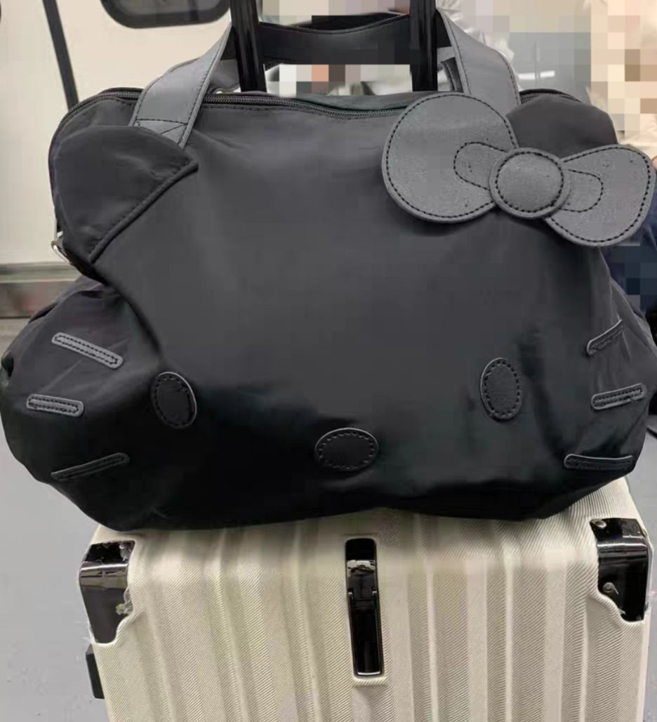 ハローキティ ボストンバッグ 黒 - メルカリ