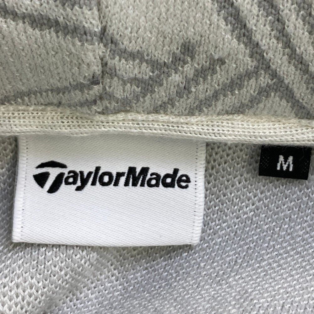 サイズ：M TAYLOR MADE テーラーメイド 2024年 フード付 ニット セーター 総柄 ホワイト系 [240101440615] ゴルフウェア メンズ ストスト サイズ：M TAYLOR MADE テーラーメイド 2024年 フード付 ニット