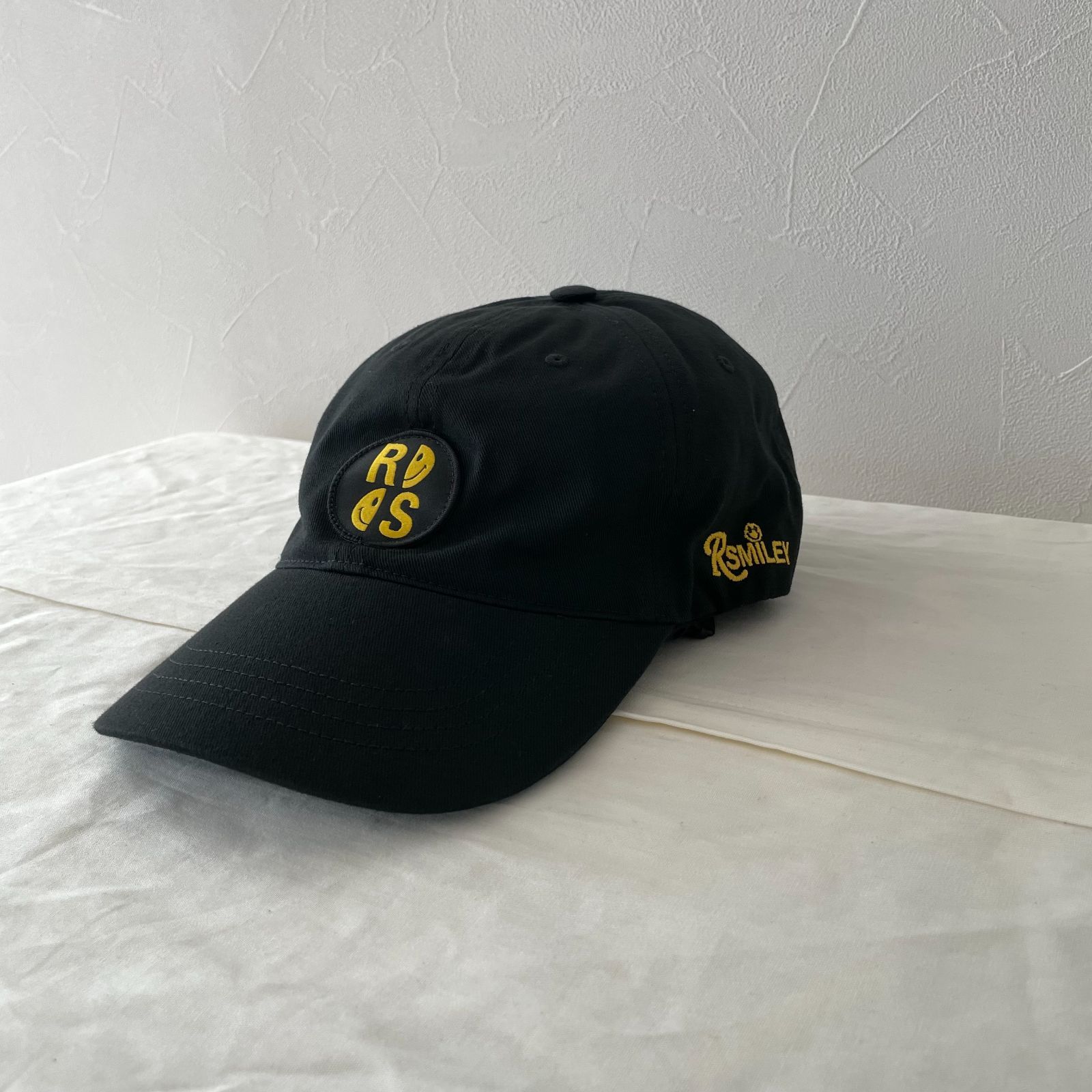 新品】RAF SIMONS（ラフシモンズ）SMILEY LOGO CAP - メルカリ