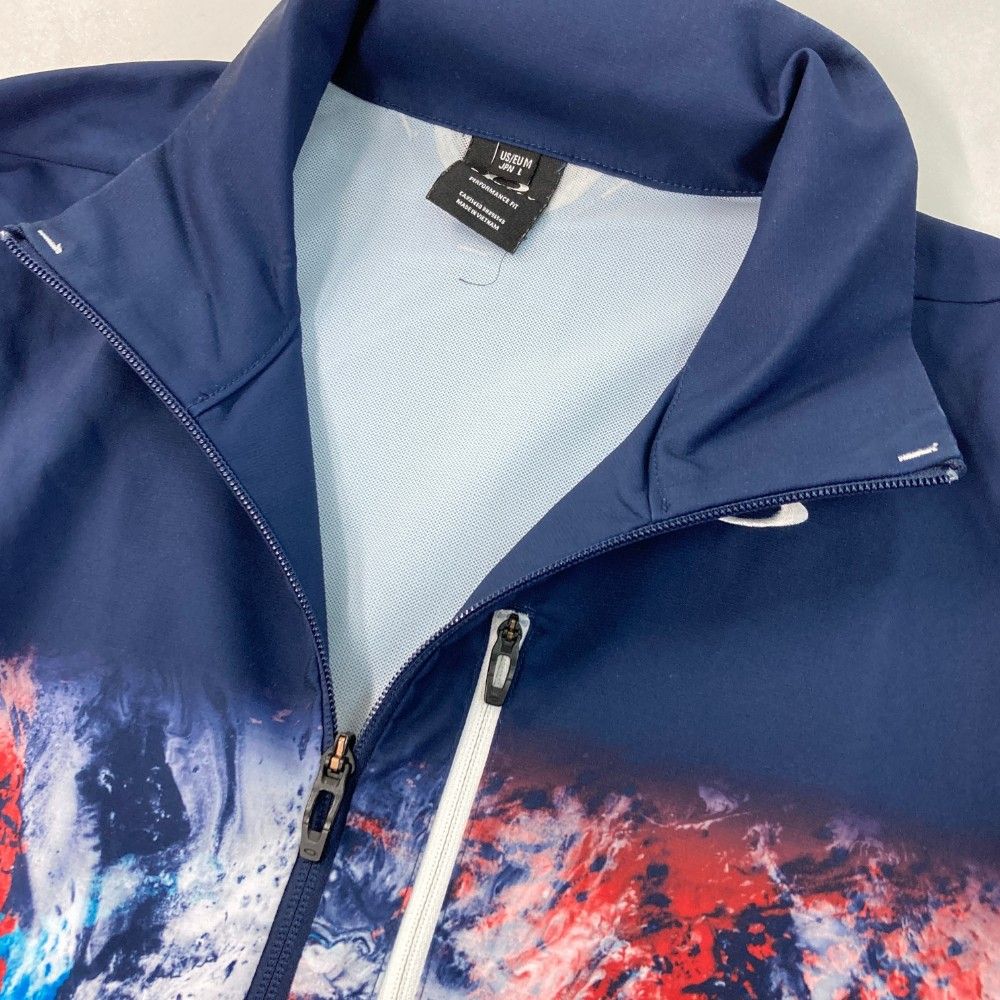サイズ：L OAKLEY オークリー  ジップジャケット  ネイビー系 [240101455276] ゴルフウェア メンズ ストスト サイズ：L OAKLEY オークリー ジップジャケット ネイビー系