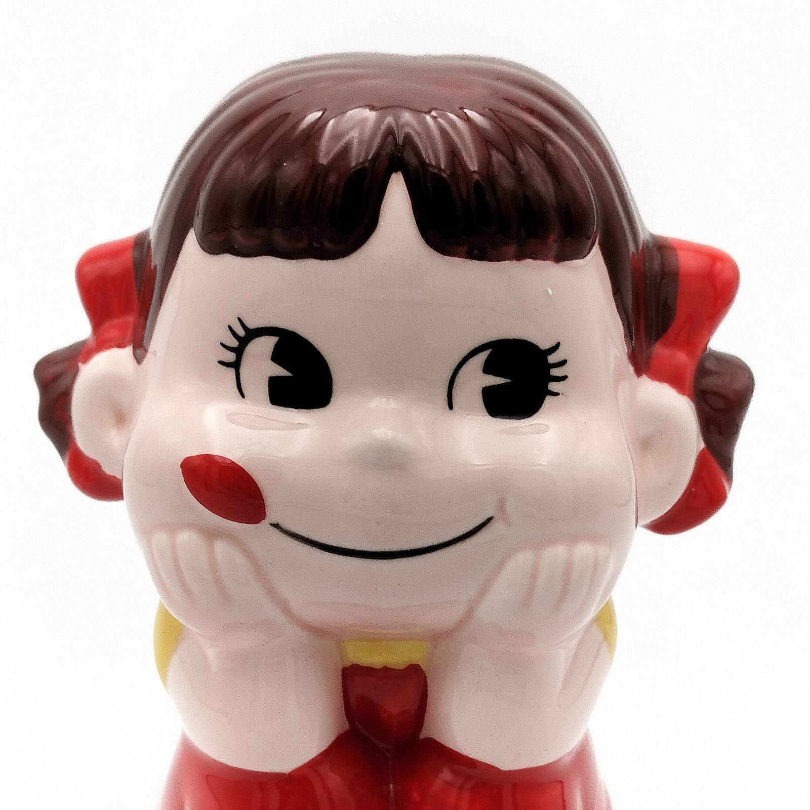 ペコちゃん　貯金箱　陶器 Amazon.co.jp: レア 57年 夢見る‪ ペコちゃん 貯金箱 陶器製‬