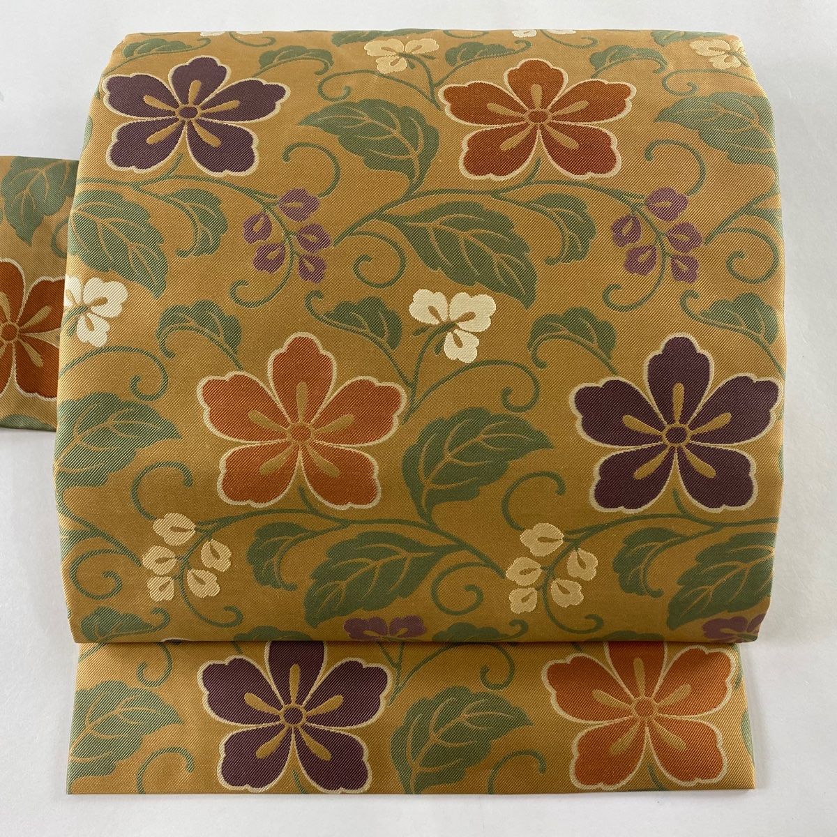 名古屋帯 紬 四角に花柄模様 薄芝翫茶色 O-4783