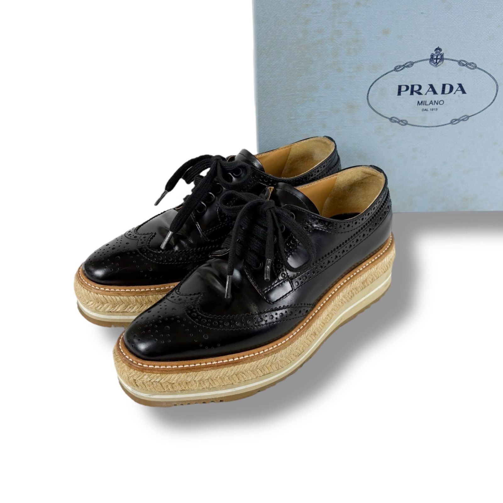 PRADA 黒 レザー ウィングチップ厚底靴 プラダ シューズ 【公式通販】