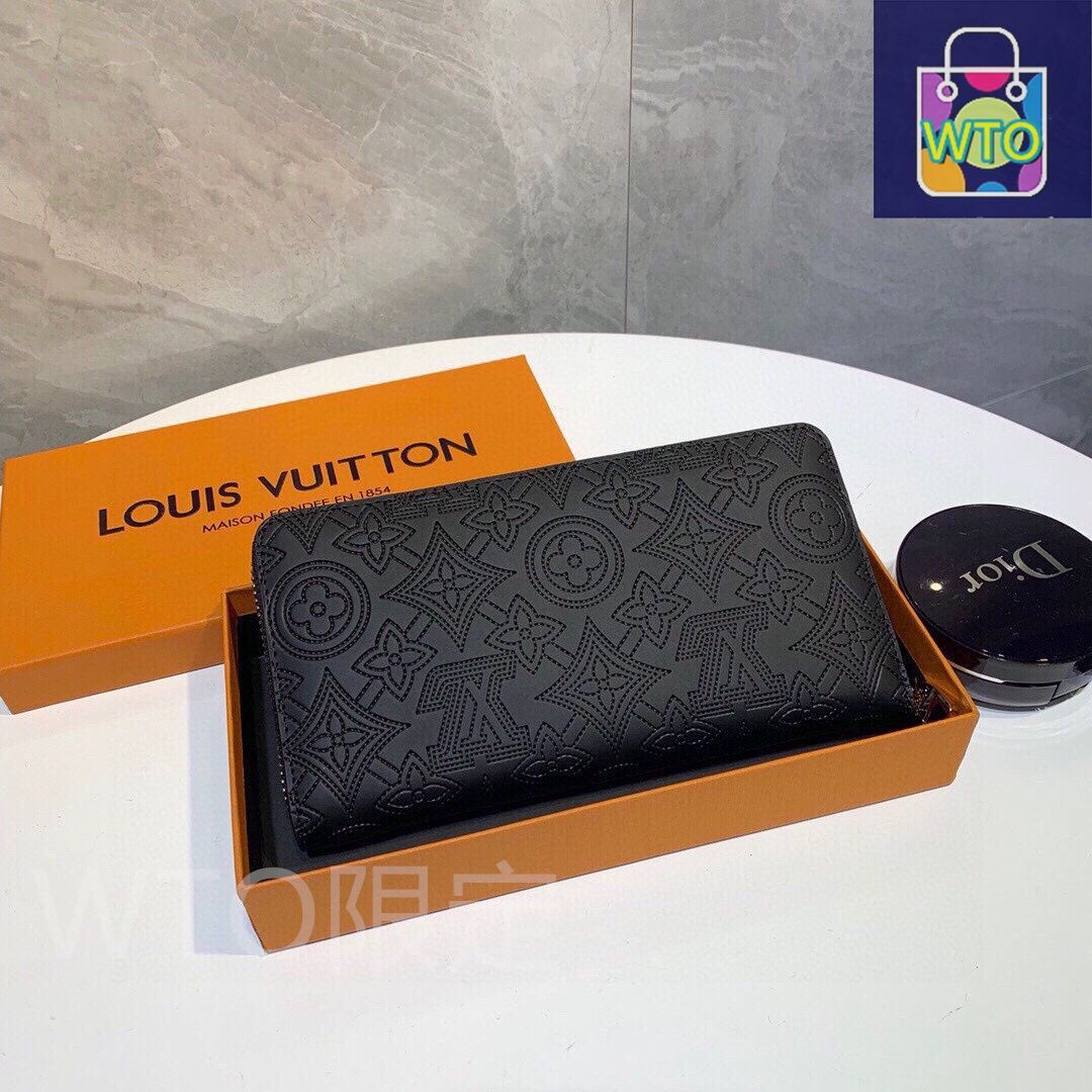 牛皮圧花ポーチ