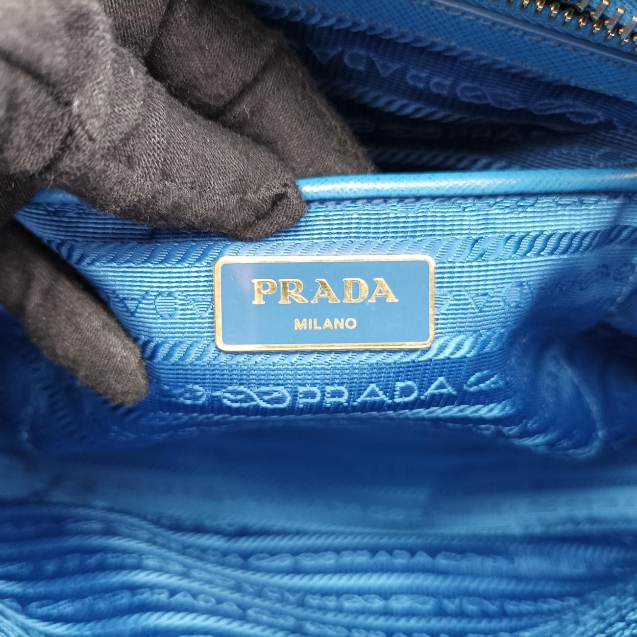 プラダPradaプロムナード ブルー サフィアーノレザー BN2538 31 H 165 DECORATOM_COM_BR