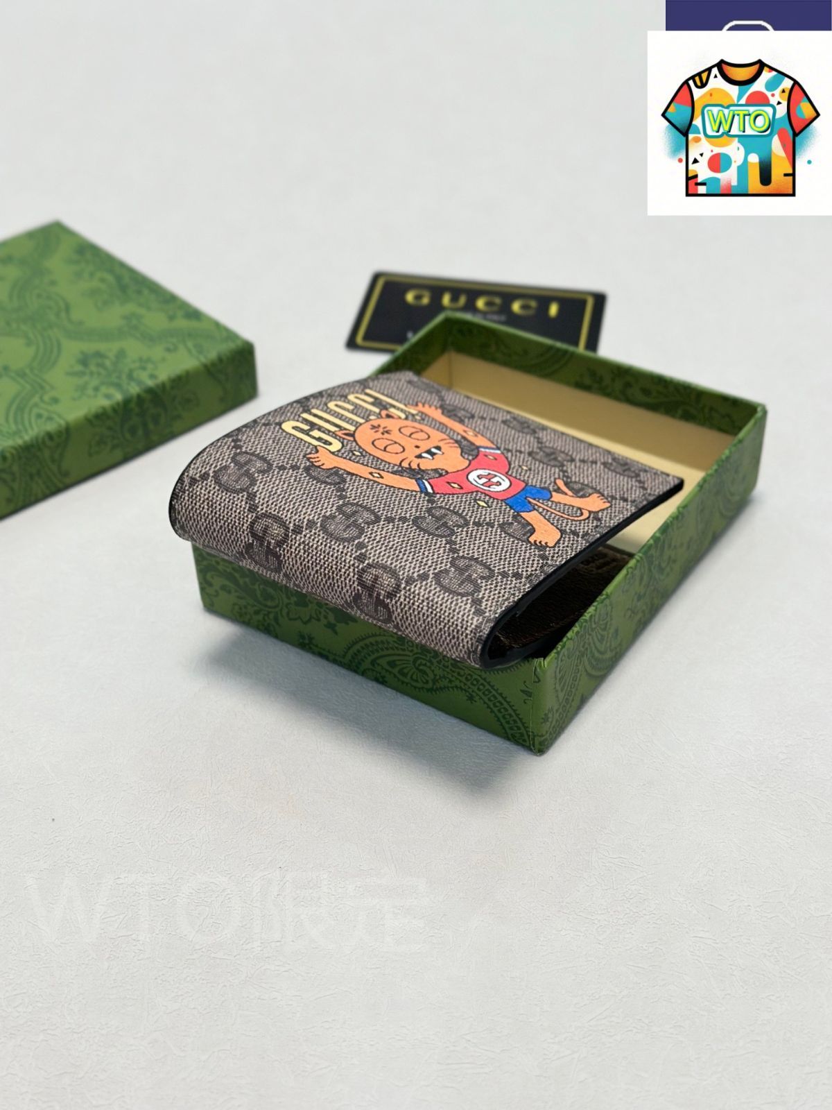 GGクラシック短款二つ折り 輸入牛皮とPVCを使用