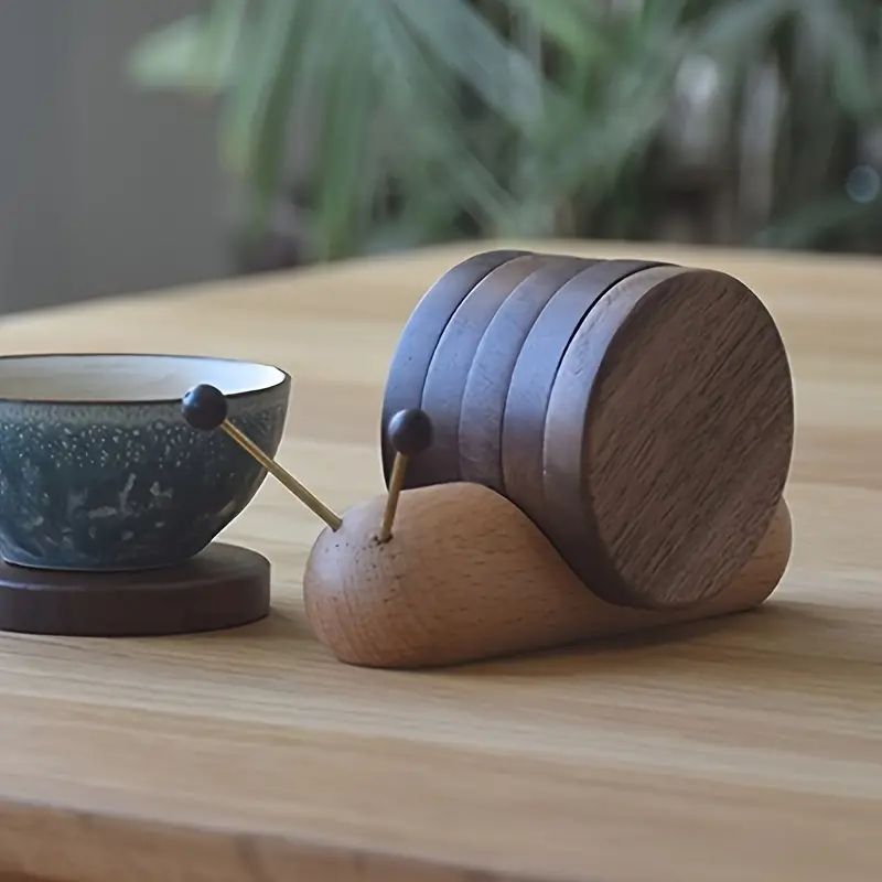 【魅力的なカタツムリ型コースターセット】高級感のあるブラックウォールナット素材 - おしゃれな耐熱ホームデコレーション