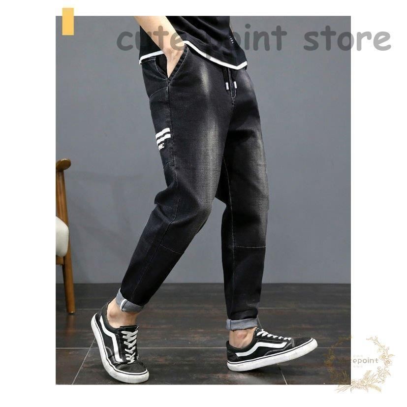 黒デニムパンツ