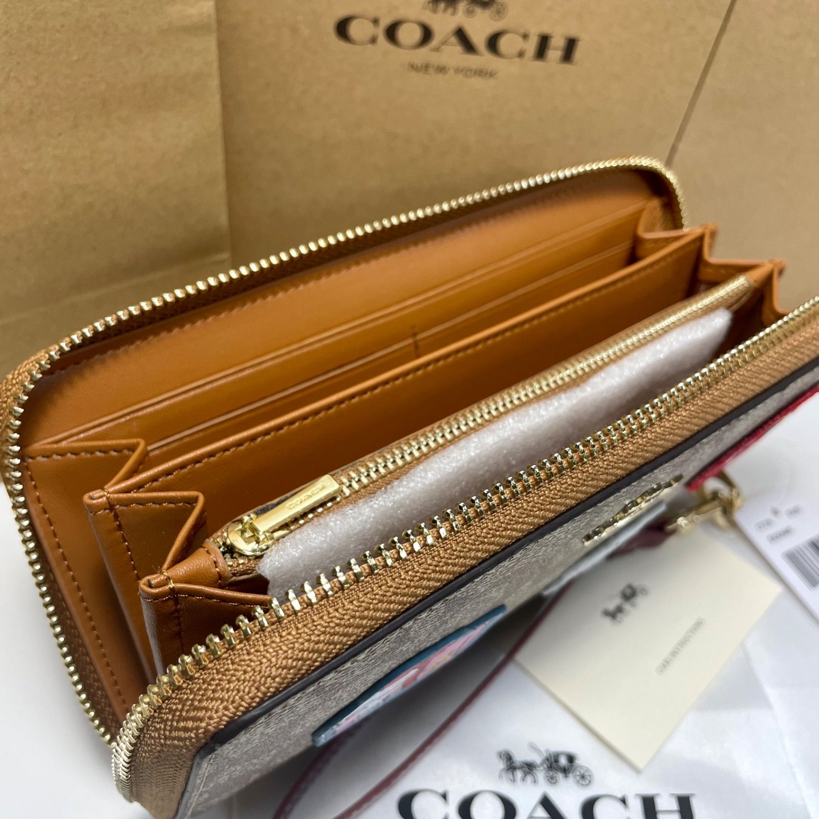 3年保証』 COACH コーチ 長財布 ストラップ スヌーピー ワッペン tdh