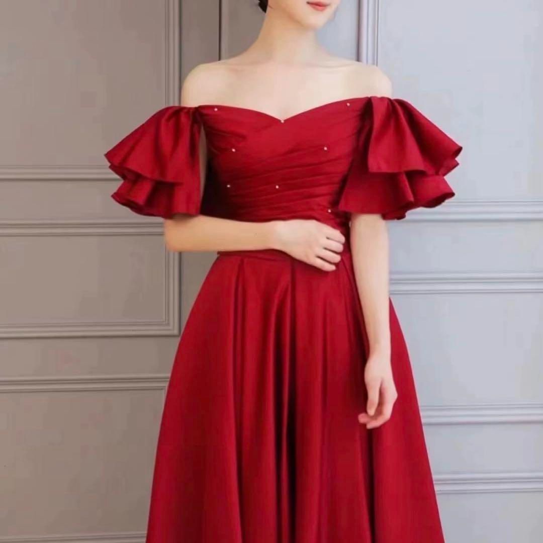 25年新作 新品未使用 フリルがゴージャスなパール付き オフショル