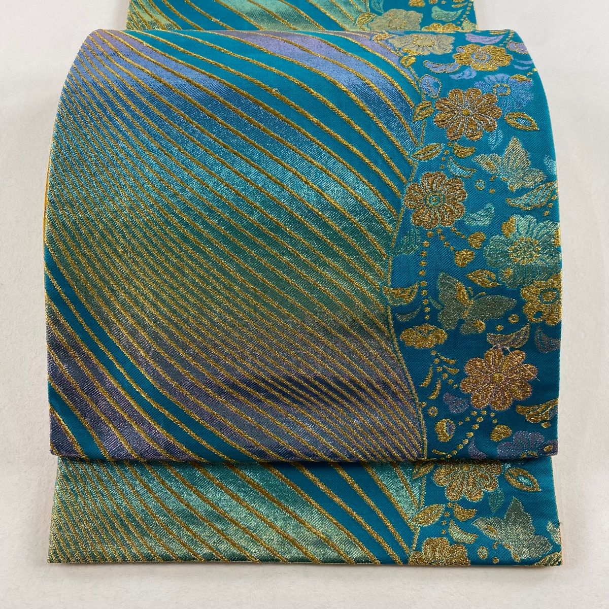 袋帯 袋帯 秀品 振袖向き 草花 蝶 金糸 ラメ箔 青緑 六通 正絹 【中古】