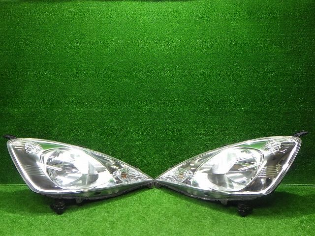 迅速/美品 ホンダ フィット ヘッドライト 左右￼ハロゲン P6865