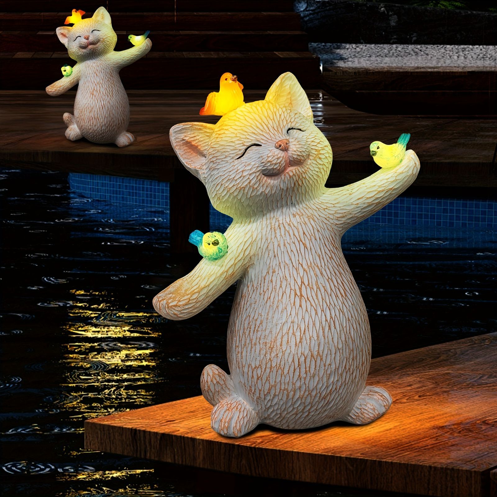 小鳥と遊んでいるネコ 猫