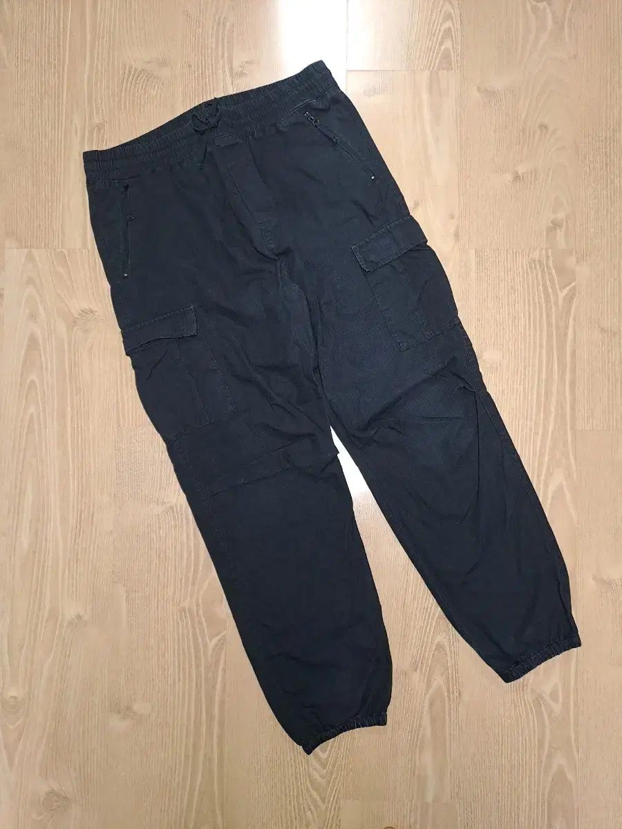 メンズ Carhartt(カーハート) カーゴ ジョガーパンツ サンライズ 105