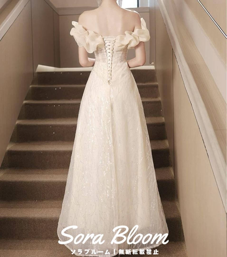 新品・未使用】スパンコールにフリルがオシャレで美しい