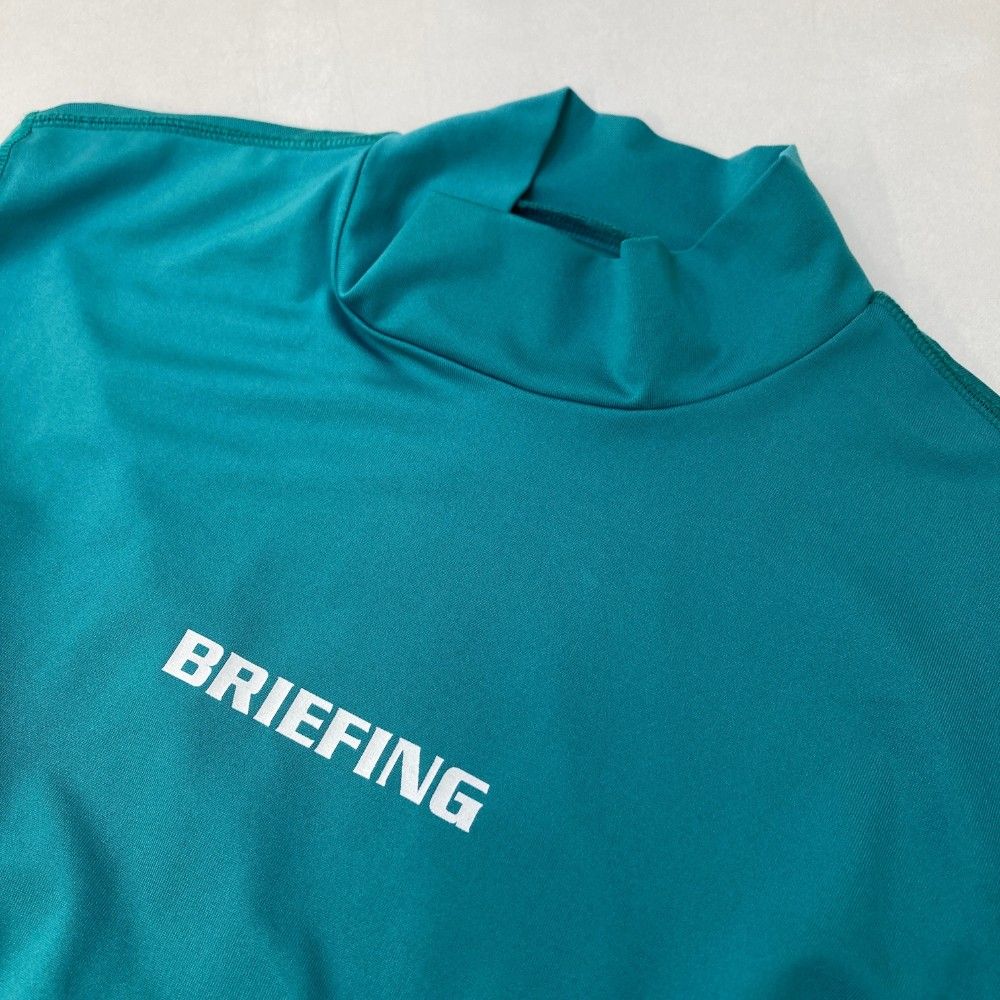 サイズ：M BRIEFING GOLF ブリーフィング  ハイネック長袖Tシャツ  グリーン系 [240101471813] ゴルフウェア メンズ ストスト サイズ：M BRIEFING GOLF ブリーフィング ハイネック長袖Tシャツ