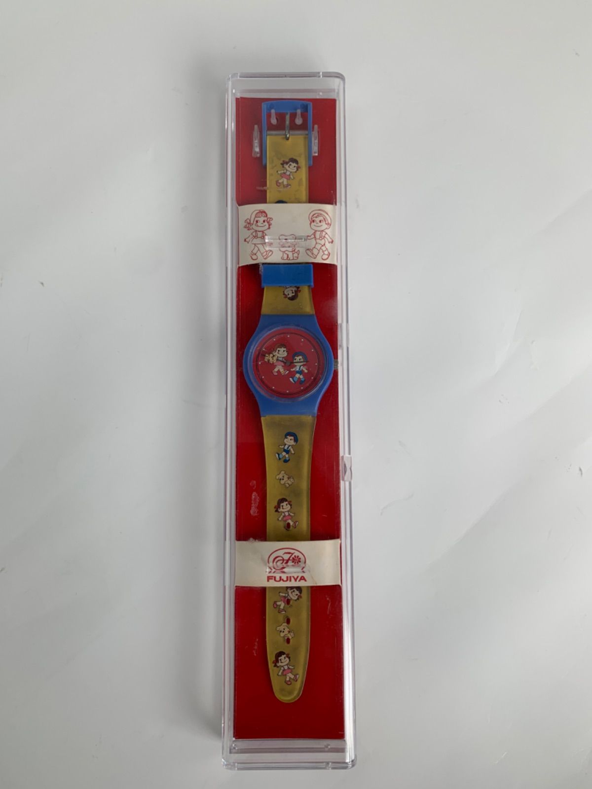 ペコテール ペコちゃん人形　ピンクリボン　レア　希少品　非売品　懸賞品 不ニ家 ペコちゃん ポコちゃん 腕時計 高島屋 昭和レトロ - メルカリ