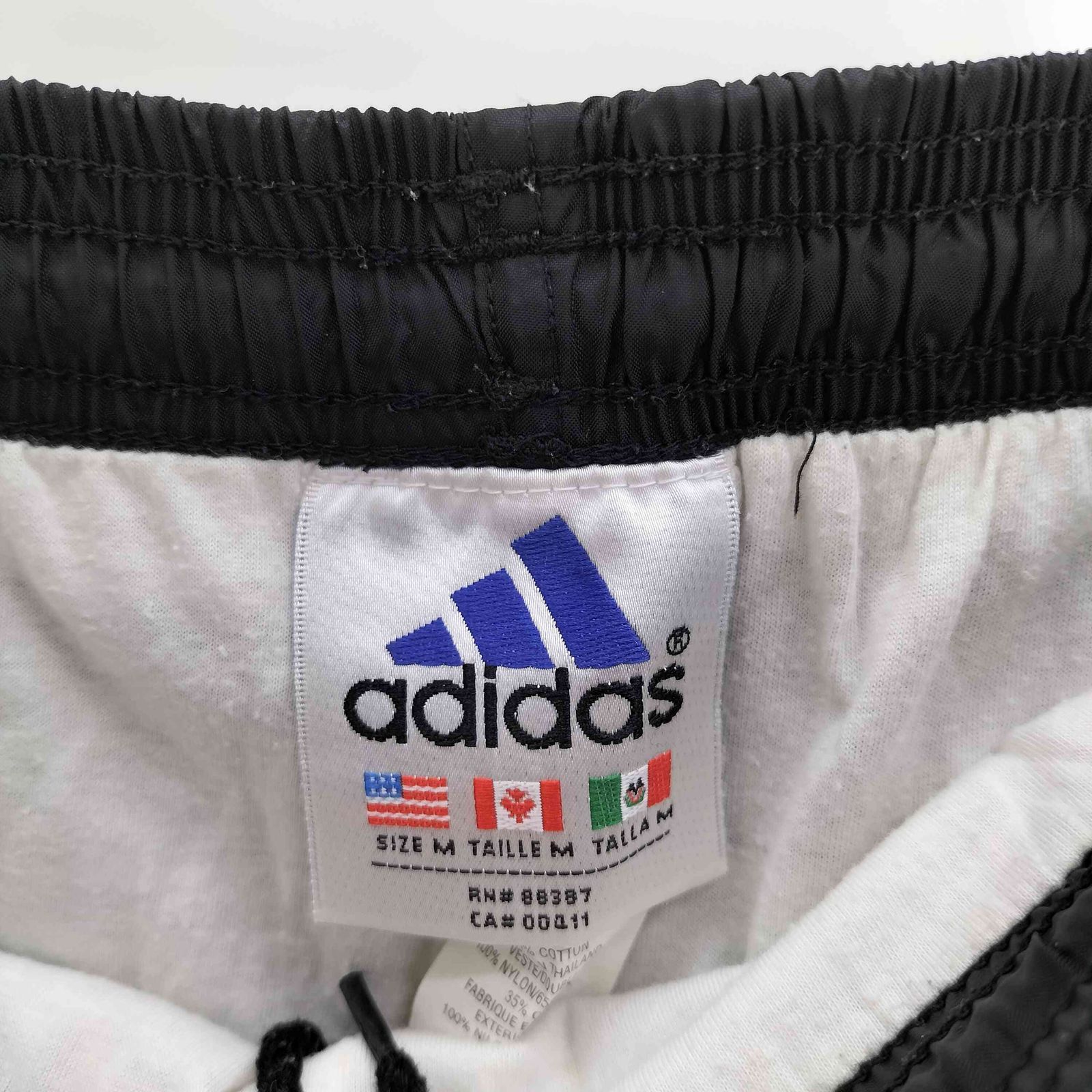 アディダス adidas 90S 万国旗タグ パフォーマンス ロゴ 刺繍