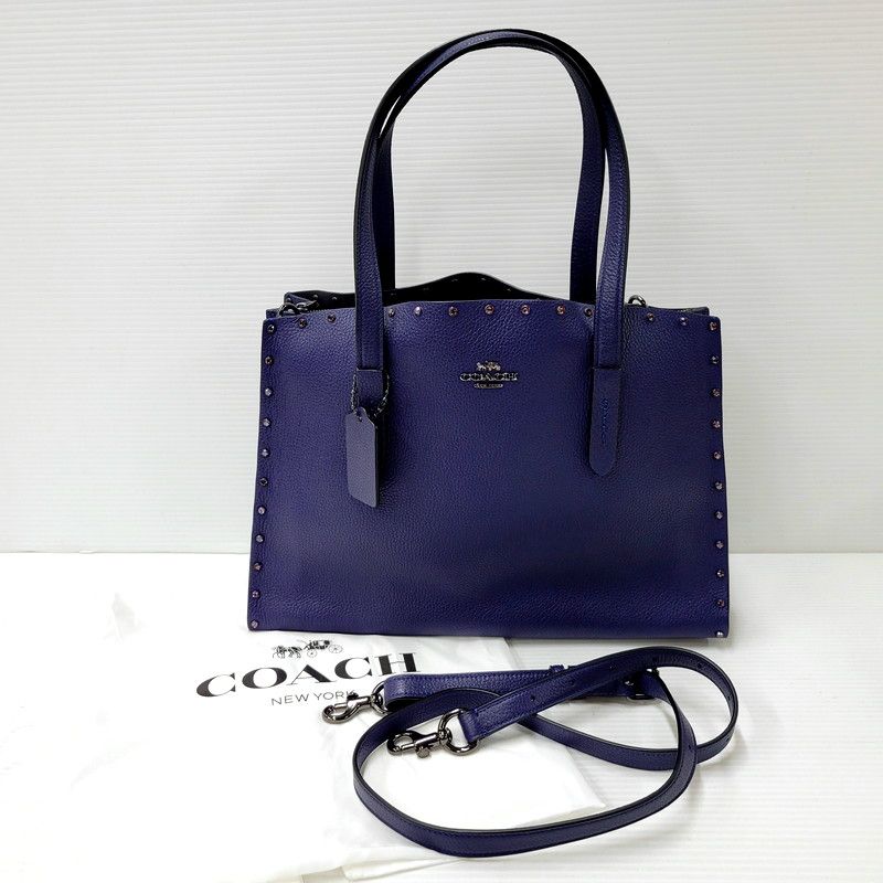 中古品】COACH コーチ 2WAY TOTE BAG 38629 チャーリーキャリーオールクリスタルリベット トートバッグ カバン 鞄  カラー：ネイビー レディース 【180-241110-as-20-izu】 - メルカリ