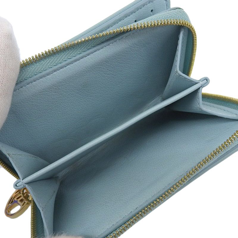ルイヴィトン LOUIS VUITTON モノグラム エンボス ポルトフォイユ ルー