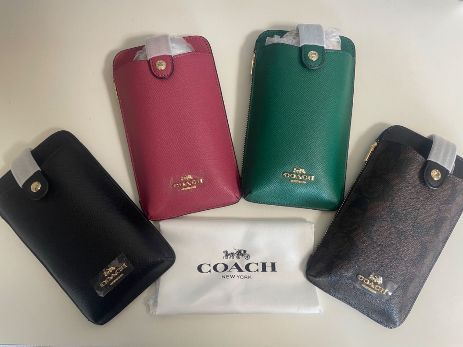 新品・未使用】COACH スマホショルダー ブラック シグネチャー - メルカリ