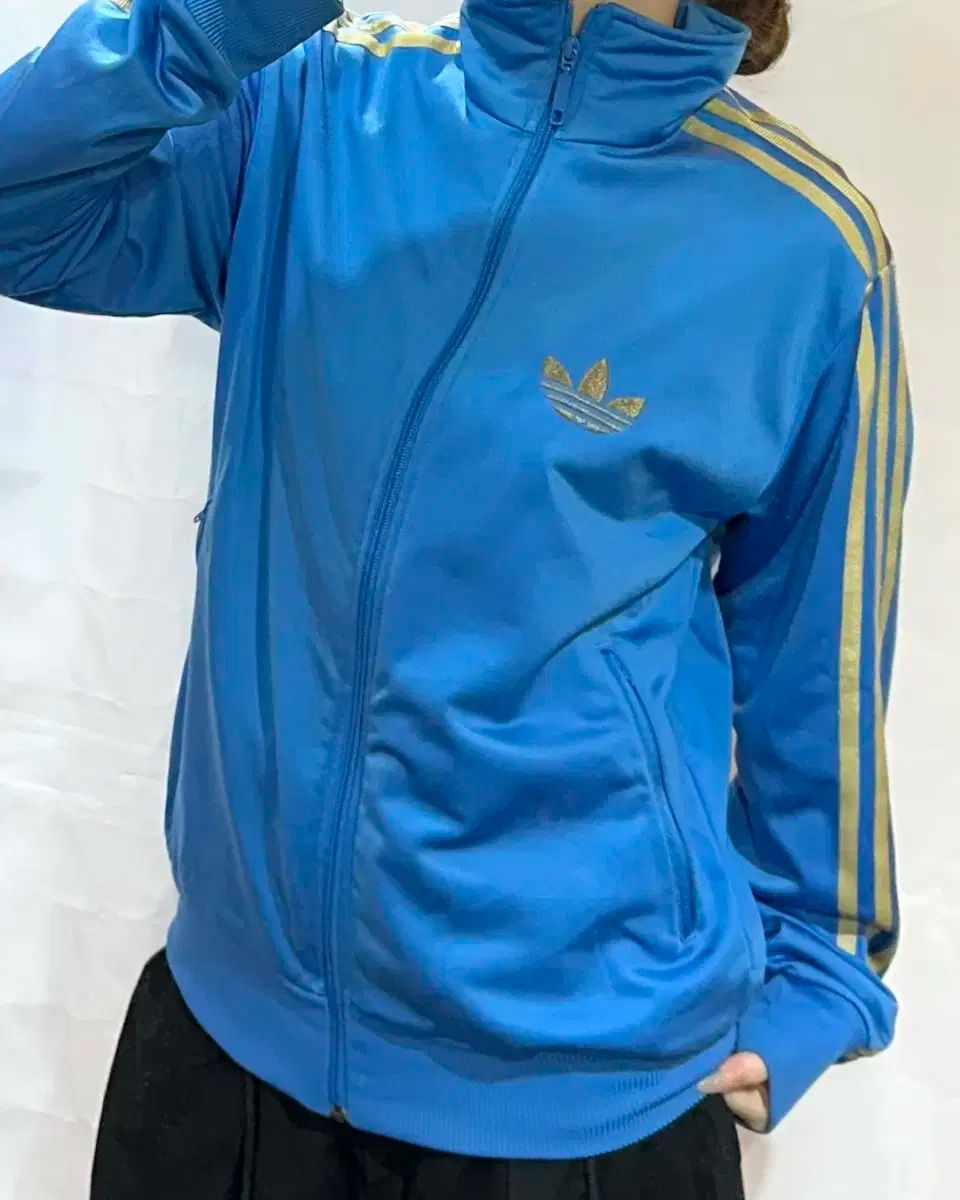 adidas アディダス グーフィーバード ライトブルー ゴールド トラックトップス