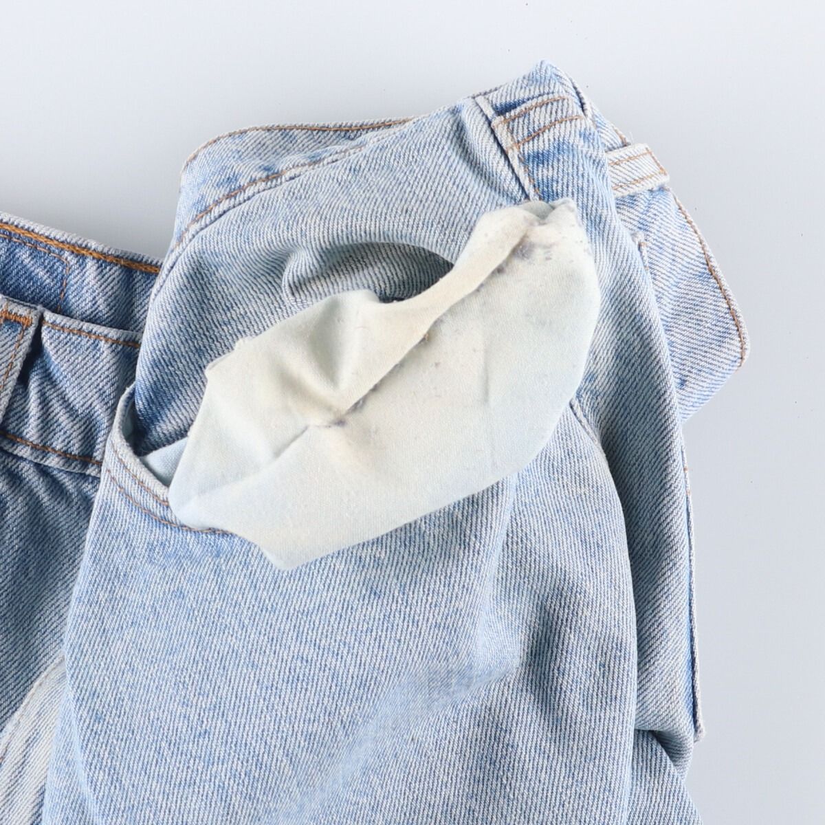 00550-4834 テーパードデニムパンツ