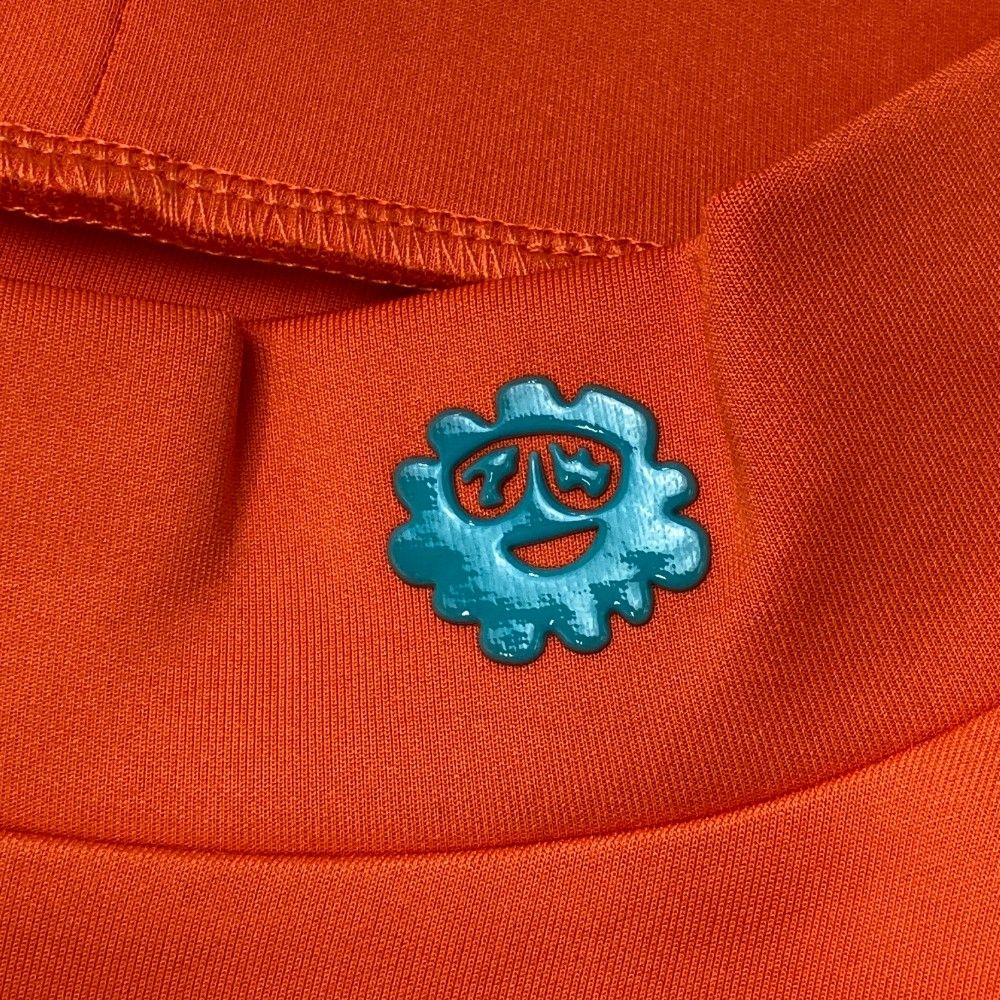 サイズ：2 PW CIRCULUS ピーダブリュサーキュラス  ハイネック長袖Tシャツ  オレンジ系 [240003001644] ゴルフウェア レディース ストスト サイズ：2 PW CIRCULUS ピーダブリュサーキュラス ハイネック