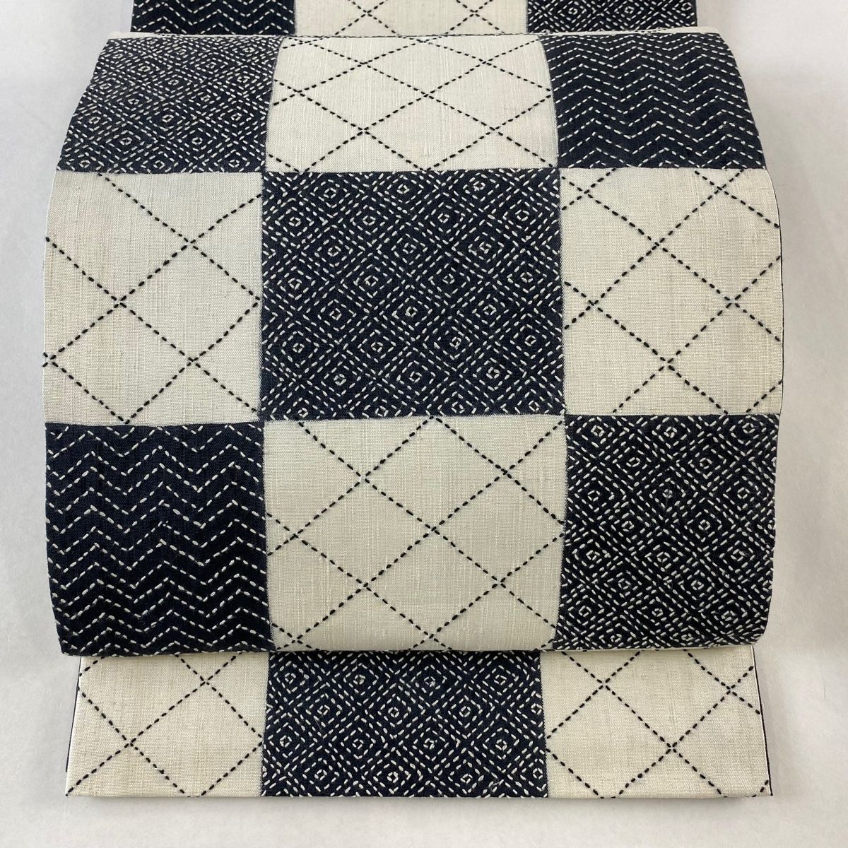 袋帯 紬地 市松 入子菱 刺し子刺繍 クリーム 六通 正絹