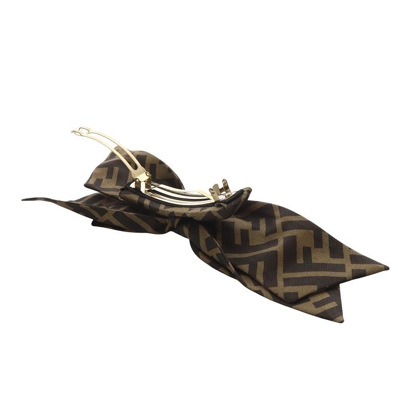 フェンディ FENDI バレッタ ズッカ柄 リボンモチーフ ブラウン