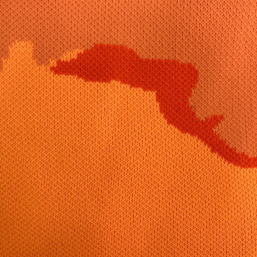 NEW BALANCE ニューバランス  半袖ポロシャツ 総柄 オレンジ系 4 [240101181957] ゴルフウェア メンズ