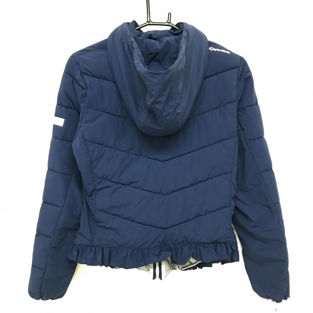 テーラーメイド フード付き中綿ジャケット M ゴルフウェア 裾フリル ハイネック 超美品】テーラーメイド フード付き中綿ジャケット ネイビー×白 ロゴ