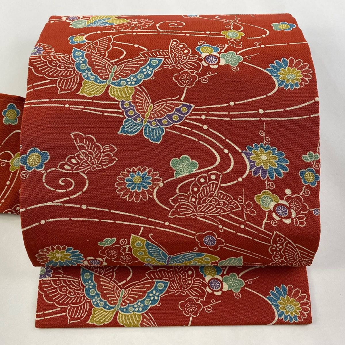 名古屋帯 秀品 蝶 枝梅 縮緬 朱色 正絹