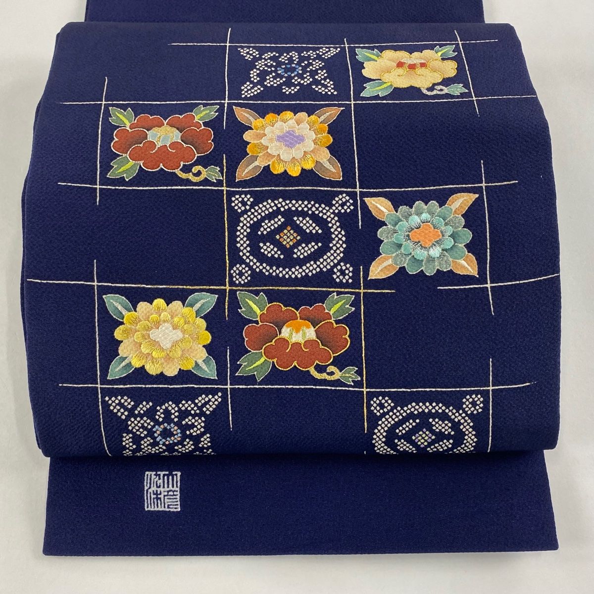 開き名古屋帯 大彦 落款 松葉仕立て 格子 草花 金銀糸 刺繍 紺色 正絹