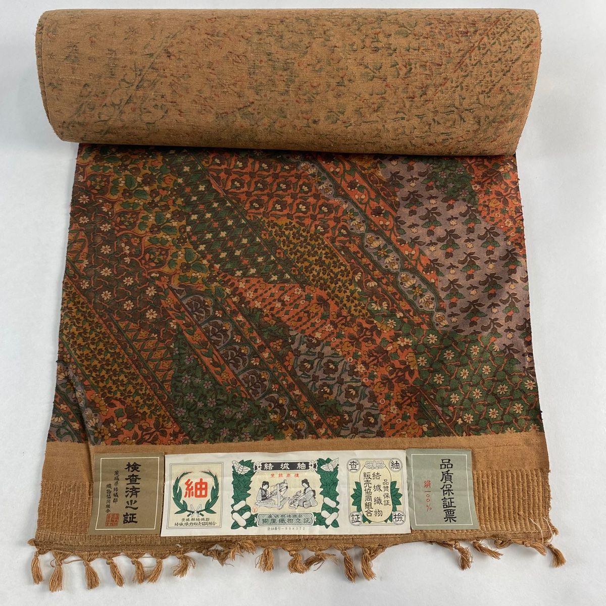 反物 秀品 小紋 紬地 証紙 草花 七宝 茶色 正絹