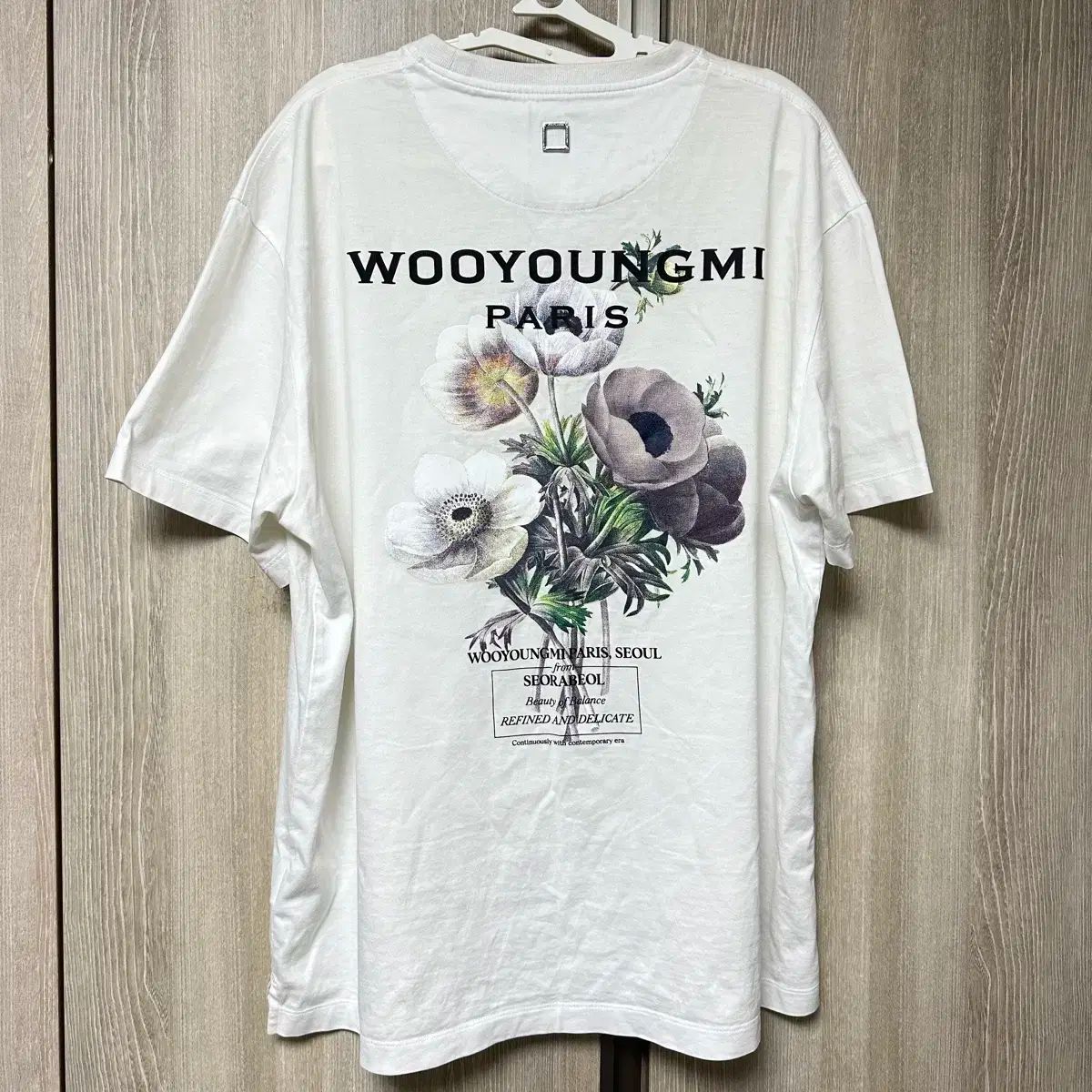48 WOOYOUNGMI(ウーヨンミ) フラワー バックロゴ 半袖 - メルカリ